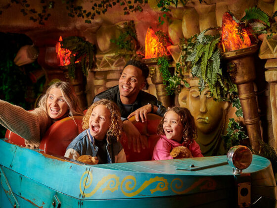 A family on the Toucan Tours ride at Fantasy Island Ingoldmells