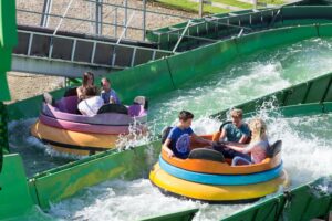 People riding the Wild River Rapids at Fantasy Island Ingoldmells